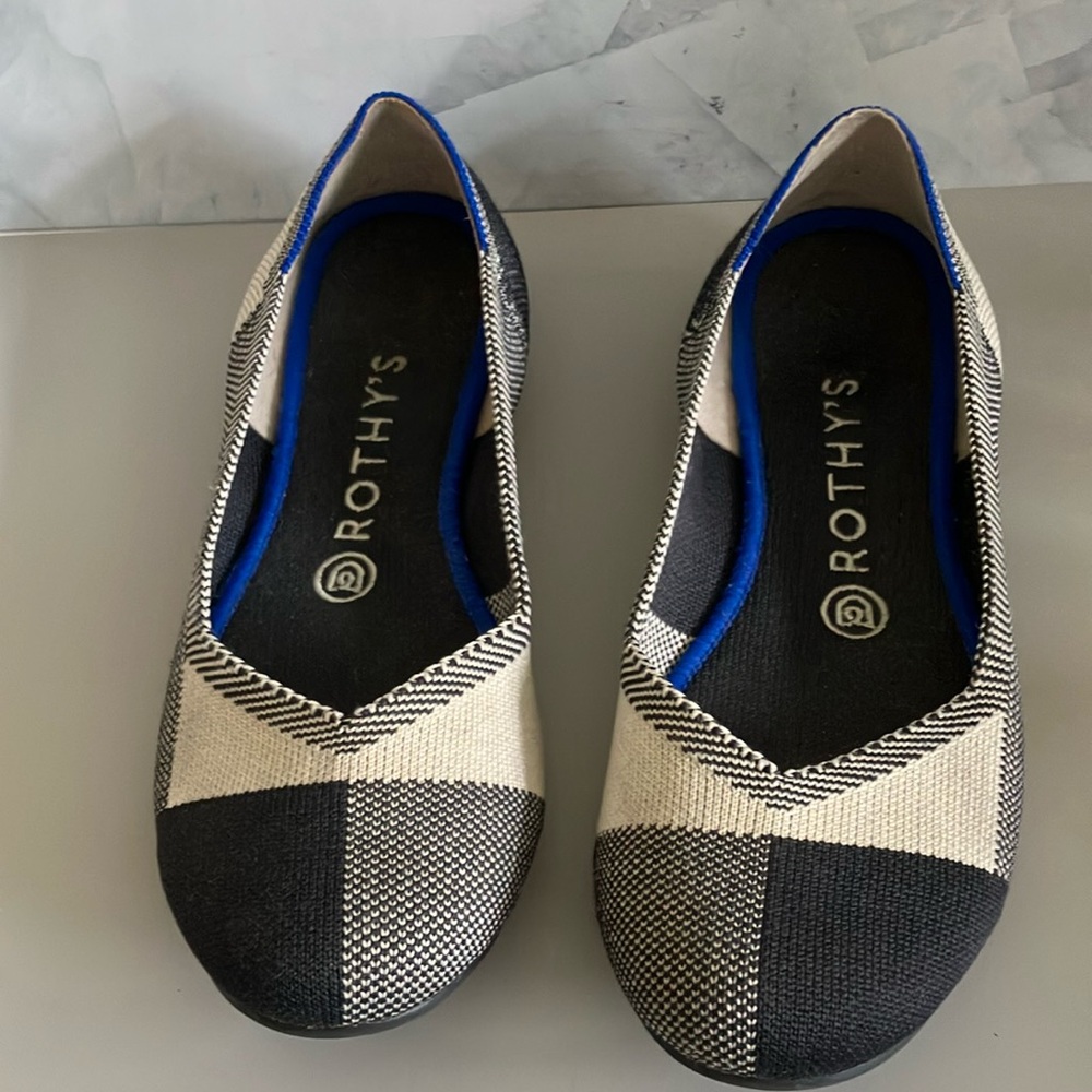 Rothy’s black and cream round toe flats